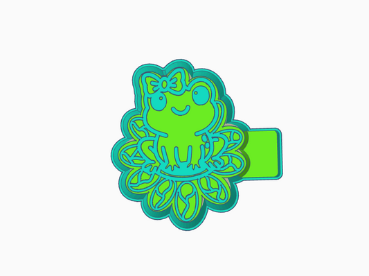 Frog on turquoise lily